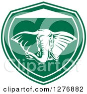 Poster, Art Print Of Retro Tough Elephant In A Green And White Shield