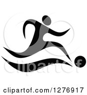 Clipart Of A Black And White Soccer Player Running And Kicking Royalty Free Vector Illustration by Vector Tradition SM