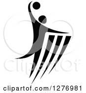 Clipart Of A Black And White Volleyball Or Basketball Player In Action Royalty Free Vector Illustration by Vector Tradition SM