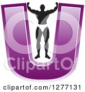 Poster, Art Print Of Flexing Black And White Male Bodybuilder Stretching Out A Purple Letter U