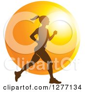 Poster, Art Print Of Silhouetted Woman Running Over A Sunset Circle