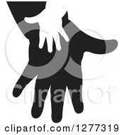 Poster, Art Print Of White Silhouetted Childs Hand On A Black Parents Hand