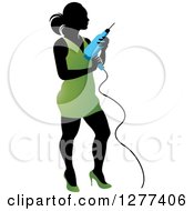 Poster, Art Print Of Black Silhouetted Woman In A Green Dress Holding A Power Drill