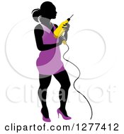 Poster, Art Print Of Black Silhouetted Woman In A Purple Dress Holding A Power Drill