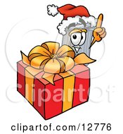Garbage Can Mascot Cartoon Character Standing By A Christmas Present