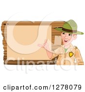 Friendly White Male Park Ranger Presenting Notices On A Board