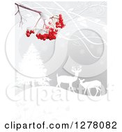 Poster, Art Print Of Christmas Winter Background Of Red Berries Over Silhouetted Deer In The Snow