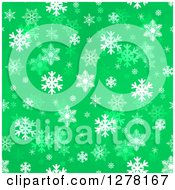 Poster, Art Print Of Seamless Christmas Background Of White Winter Snowflakes On Green