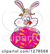 Poster, Art Print Of Pink Easter Bunny Licking His Lips Behind A Large Egg
