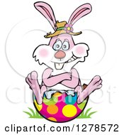 Poster, Art Print Of Pink Easter Bunny Sitting On A Broken Egg