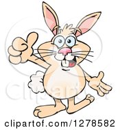 Clipart Of A Happy Rabbit Holding A Thumb Up Royalty Free Vector Illustration