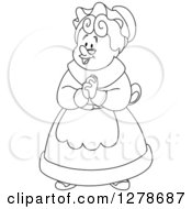 Black And White Senior Woman Or Mrs Claus Clasping Her Hands Together