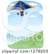 Happy Man Hang Gliding Over A Valley