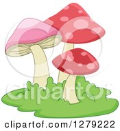 Clipart Of Red And Pink Mushrooms Royalty Free Vector Illustration