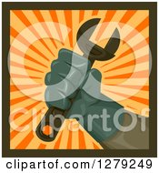 Clipart Of A Workers Hand Holding Up A Wrench Over A Burst Of Rays Royalty Free Vector Illustration