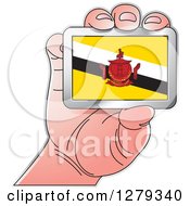 Poster, Art Print Of Caucasian Hand Holding A Brunei Flag