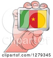 Caucasian Hand Holding A Cameroonian Flag