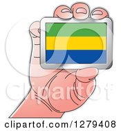 Caucasian Hand Holding A Gabonese Flag