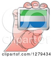 Poster, Art Print Of Caucasian Hand Holding A Sierra Leone Flag