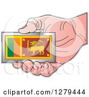 Caucasian Hand Holding A Small Sri Lanka Flag