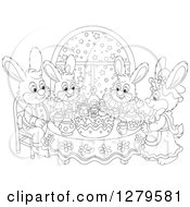 Poster, Art Print Of Cute Black And White Bunny Rabbit Family Sitting Around A Christmas Cake By A Snowy Starry Window