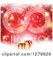 Clipart Of 3d Gold And Red Christmas Gifts Over Gold And Red Snow And Bokeh Royalty Free Vector Illustration