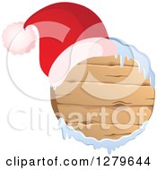 Poster, Art Print Of Santa Hat On A Round Wooden Christmas Sign With Snow
