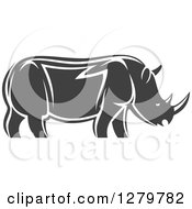 Clipart Of A Gray And White Tribal Rhino In Profile Royalty Free Vector Illustration