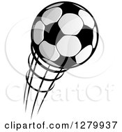 Clipart Of A Grayscale Flying Soccer Ball 2 Royalty Free Vector Illustration