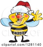 Poster, Art Print Of Friendly Waving Bee Wearing A Christmas Santa Hat