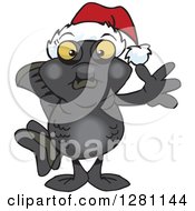 Poster, Art Print Of Friendly Waving Black Moor Fish Wearing A Christmas Santa Hat