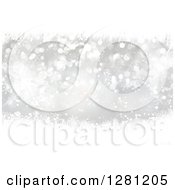 Poster, Art Print Of Silver Christmas Background Of Tinsel Snowflakes And Bokeh Flares