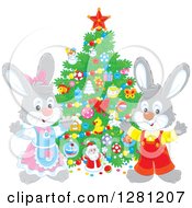 Poster, Art Print Of Cute Festive Rabbits By A Christmas Tree