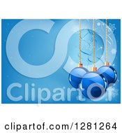 Poster, Art Print Of Background Of Christmas Baubles Suspended Over Blue With Ribbons Sparkles And Snowflakes