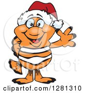 Poster, Art Print Of Friendly Waving Clownfish Wearing A Christmas Santa Hat