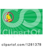 Clipart Of A Retro Fireman Holding An Axe And Green Rays Background Or Business Card Design Royalty Free Illustration
