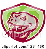 Clipart Of A Retro Attacking Viper Snake Head In A Maroon White And Green Shield Royalty Free Vector Illustration