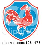 Clipart Of A Retro Profiled Woodcut Rooster In A Red White And Blue Shield Royalty Free Vector Illustration