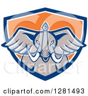 Poster, Art Print Of Retro Angry Elephant Head In A Blue White And Orange Shield