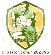 Poster, Art Print Of Retro Male Rugby Player Running In A Green White And Yellow Shield