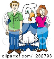 Happy Seahawk School Mascot Character Posing With Parents