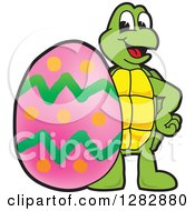 Poster, Art Print Of Happy Turtle School Mascot Character With A Giant Easter Egg
