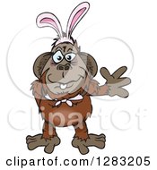 Clipart Of A Friendly Waving Orangutan Monkey Wearing Easter Bunny Ears Royalty Free Vector Illustration