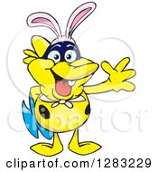 Clipart Of A Friendly Waving Yellow Marine Fish Wearing Easter Bunny Ears Royalty Free Vector Illustration