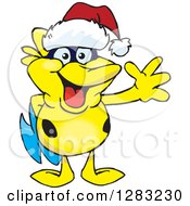 Poster, Art Print Of Friendly Waving Yellow Marine Fish Wearing A Christmas Santa Hat