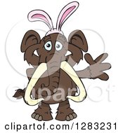 Clipart Of A Friendly Waving Mammoth Wearing Easter Bunny Ears Royalty Free Vector Illustration