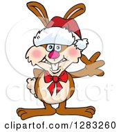 Poster, Art Print Of Friendly Waving Brown Easter Bunny Rabbit Wearing A Christmas Santa Hat