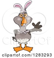 Clipart Of A Friendly Waving Goose Wearing Easter Bunny Ears Royalty Free Vector Illustration by Dennis Holmes Designs