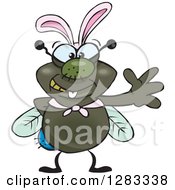 Clipart Of A Friendly Waving House Fly Wearing Easter Bunny Ears Royalty Free Vector Illustration