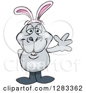 Clipart Of A Friendly Waving Dugong Wearing Easter Bunny Ears Royalty Free Vector Illustration